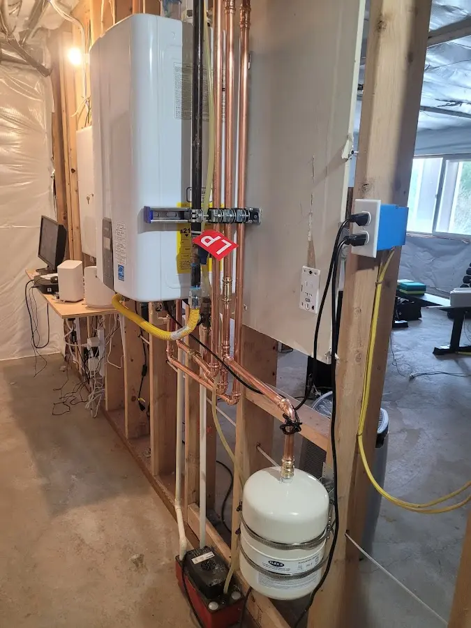 Licensed plumber repairing a kitchen sink in Germantown